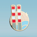 A circular enamel pin featuring a stylized illustration of the poolbeg towers in red and white, with stars and blue water, against a blue background.