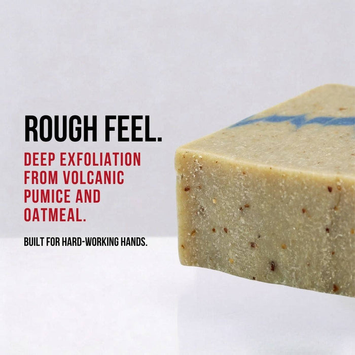 Bar of soap with exfoliating ingredients on a white background