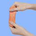 Two hands pulling apart orange putty against a blue background