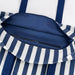 Blue and white striped bag with a visible zipper