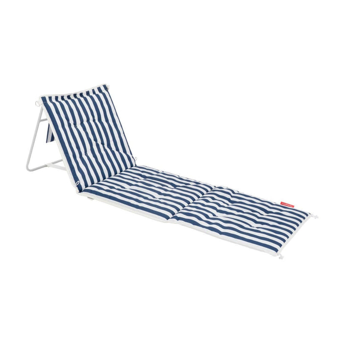 Blue and white striped lounge chair on a white background