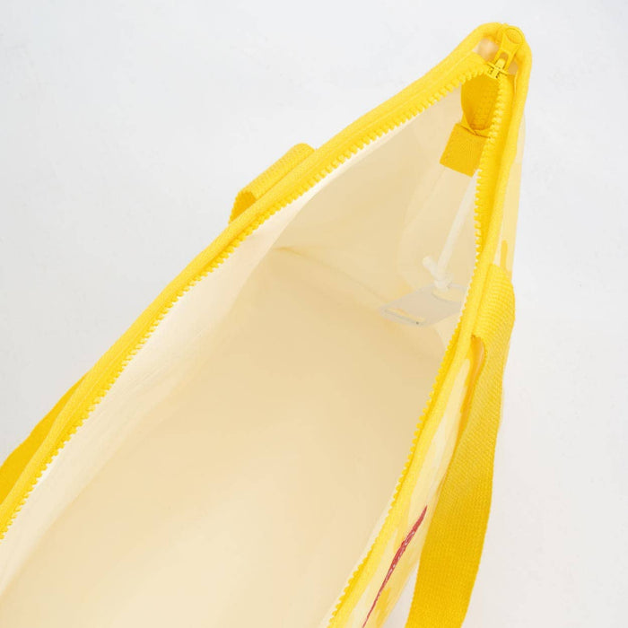 Yellow cooler bag open to show inside on a white background