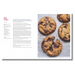 An open cookbook spread showing a recipe for Oozy gooey cookies on the left page with text, and a photo of four chocolate chip cookies on the right page.