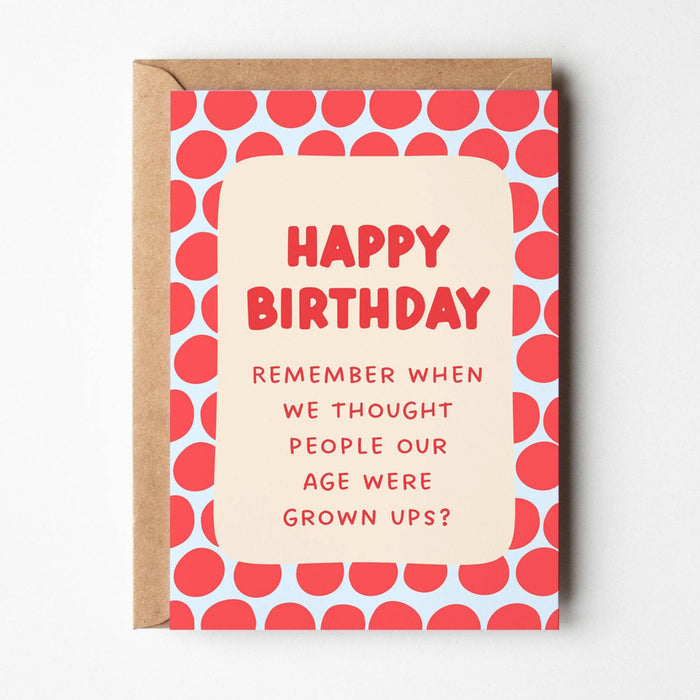 Birthday card with red text and patterned design on a white background