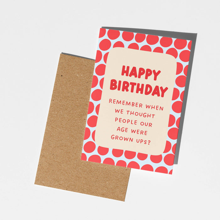Birthday card with red polka dot border and humorous text on a white background