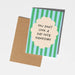 Card with striped design and text on a plain background