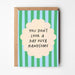 Greeting card with striped design and humorous text on a white background