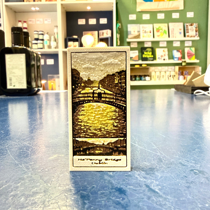 Bookmark with a black and white illustration of a bridge in a store setting