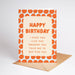 Birthday card with orange pattern and humorous message on a white background