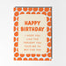 Birthday card with orange polka dot border and humorous message on a light gray background