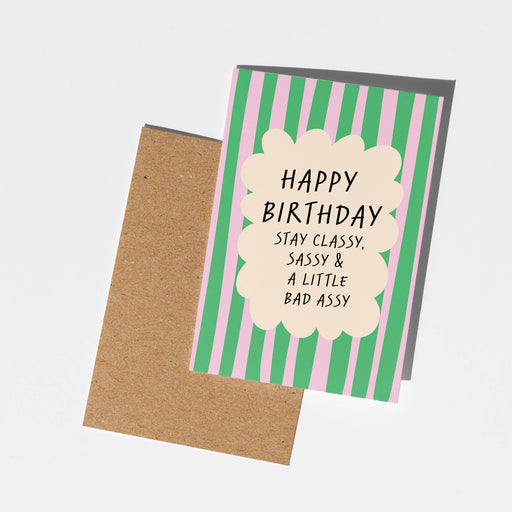 Birthday card with green and pink striped design and text on a white background