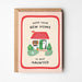 Greeting card with cartoon cat, house, and text 'Hope your new home is not haunted' on a white background