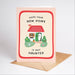 Greeting card with a cartoon house and text 'Hope your new home is not haunted' on a light pink background.