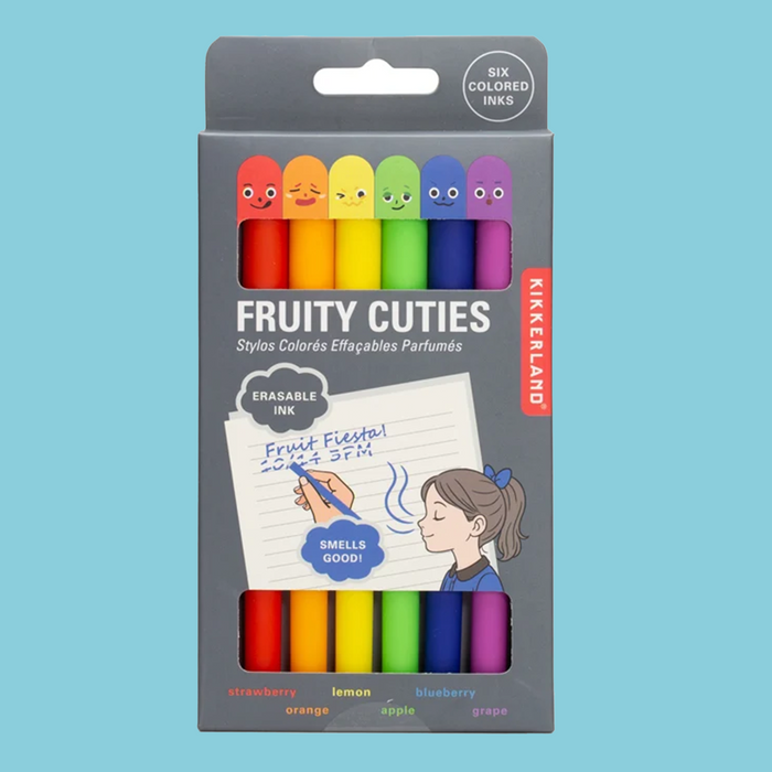 Kikkerland Fruity Cuties erasable ink set in retail packaging, featuring six colorful fruit-themed pens on the front and a blue background.
