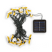 Solar-powered bee string lights with a solar panel on a white background