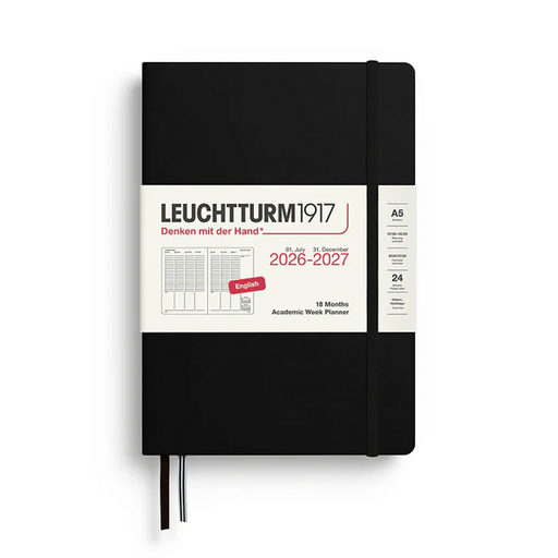A black Leuchtturm1917 18-month weekly planner with a white paper band around the middle, shown on a clean white background.