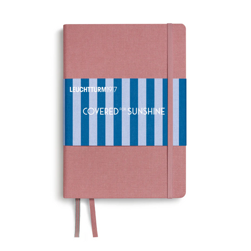 A Leuchtturm1917 hardcover notebook with a dusty pink textured cover, a blue and white striped paper band across the middle, and a matching pink ribbon bookmark, shown on a white background.