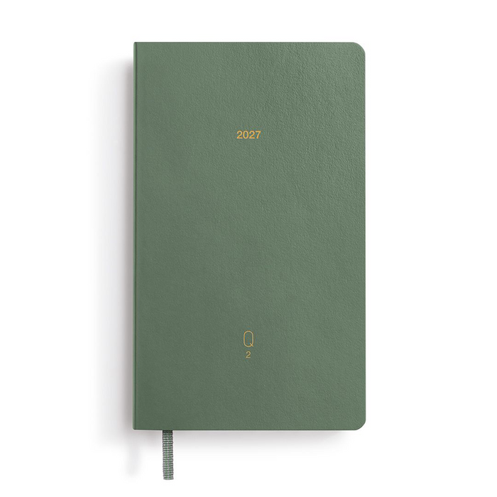 A 2027 daily planner with a textured sage green cover and gold foil details, shown closed with a gray ribbon bookmark on a white background.