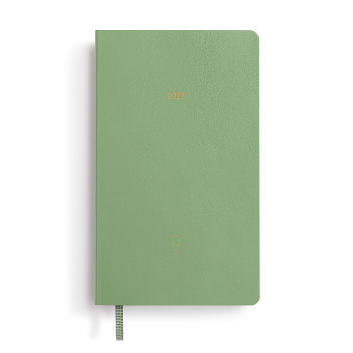 A sage green textured hardcover planner or notebook with '2027' printed in gold on the front cover, featuring a matching green ribbon bookmark, set against a plain white background.