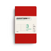A Leuchtturm1917 notebook in a solid red cover with a white paper band around the middle, displayed on a clean white background.