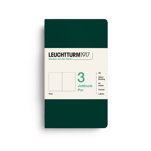 A Leuchtturm1917 pocket featuring a dark green cover with a cream-colored paper label on the front, displayed on a clean white background.