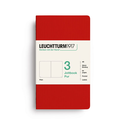 Red notebook with white label featuring 'Leuchtturm1917' on a white background
