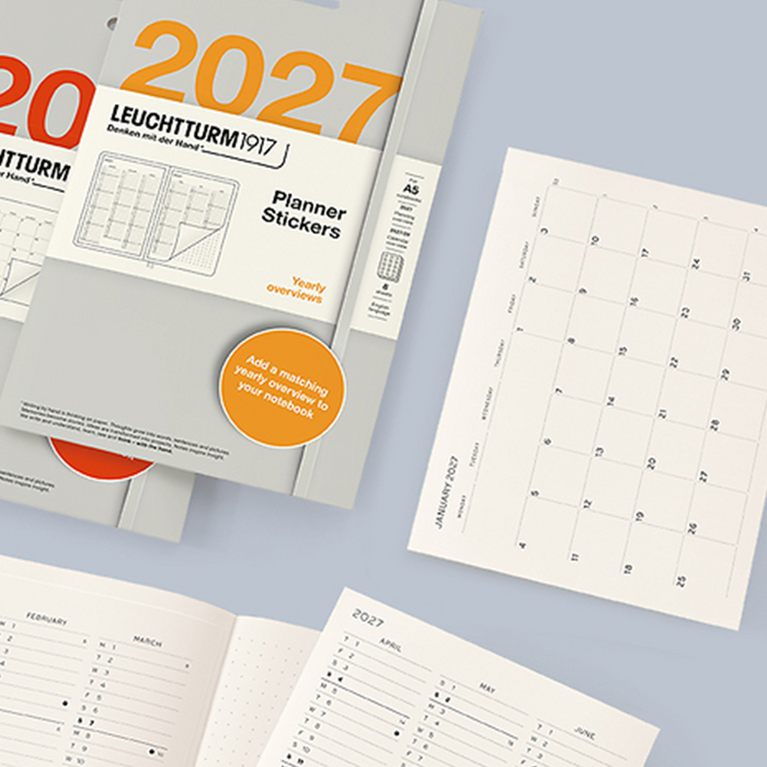 A set of 2027 Leuchtturm1917 planner stickers shown with a gray planner, open monthly calendar pages, and a separate January 2027 calendar page on a pale blue background.