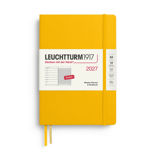 A Leuchtturm1917 2027 weekly planner notebook in a bright yellow cover, shown closed with a white paper band around the middle and a yellow ribbon bookmark hanging from the bottom, on a white background.