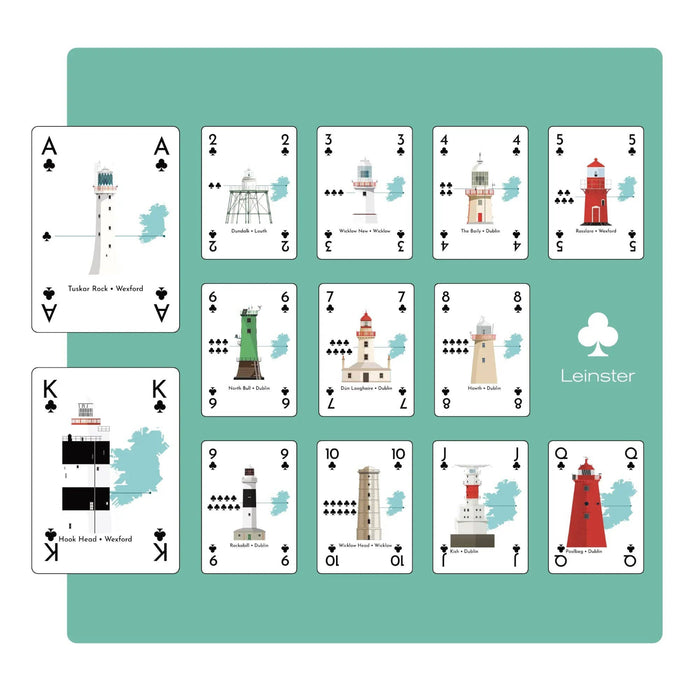 Set of playing cards with lighthouse designs on a teal background
