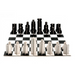 A black and white cardboard chess set with board and pieces against a white background.
