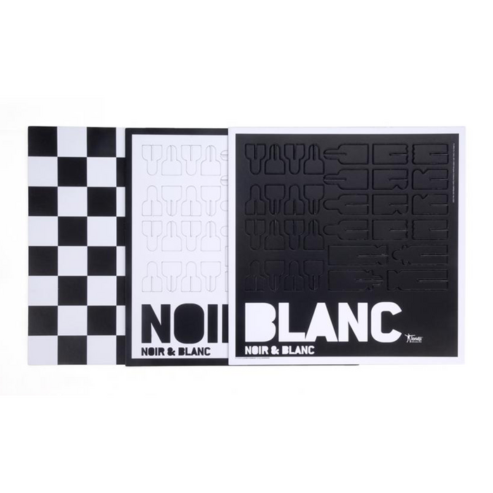 Black and white chess set packaging with "Noir & Blanc" text against a white background.