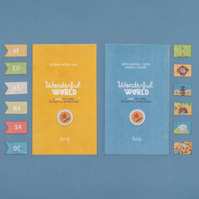 Two flat booklets titled "Wonderful World" are laid on a blue background, one yellow on the left and one light blue on the right, with small colorful tiles arranged along both sides.