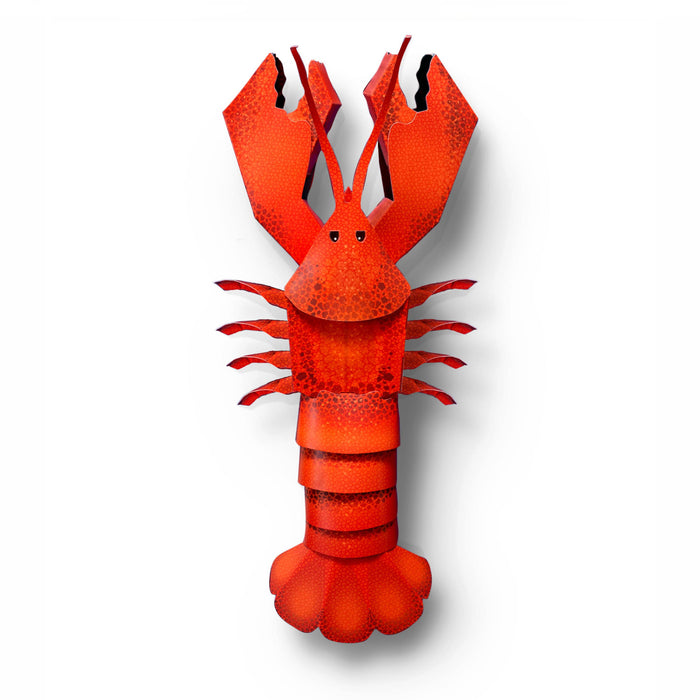 Red lobster toy on a white background