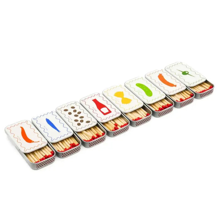 Set of matchboxes with colorful labels on a white background