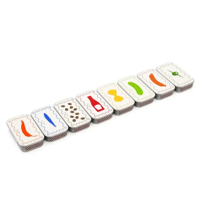 Set of colorful dominoes with different symbols on a white background