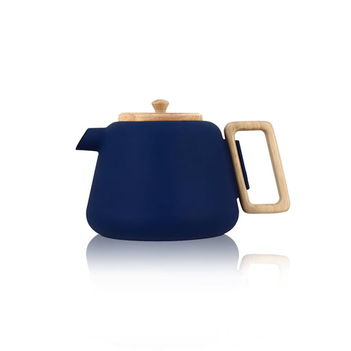 Navy blue teapot with wooden handle and lid on a white background