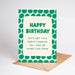 A green and white polka dot patterned birthday card with the text 'HAPPY BIRTHDAY LET'S GET THIS PARTY STARTED SO I CAN BE HOME FOR 10PM' in green lettering, displayed with a brown envelope on a light gray background.