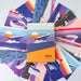 Colorful cards and box with 'arsa' branding on a light gray background