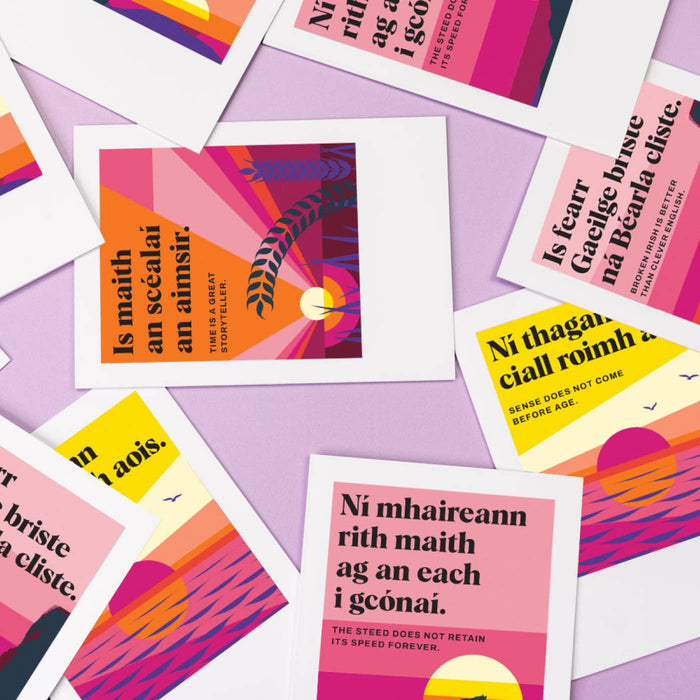 Colorful cards with text and abstract designs on a purple background