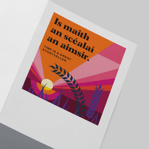 A cardwith a white border, featuring a colorful retro-style illustration and the text 'Is maith an scéalai an aimsir.' and 'TIME IS A GREAT STORYTELLER.