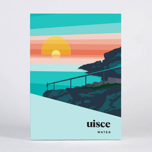 Box with a sunset over water design and 'uisce water' branding.