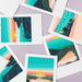 Colorful landscape illustrations on white cards with lilac background.