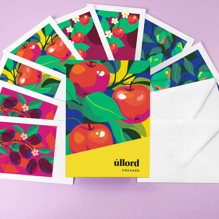 Colorful greeting cards with apple designs and 'ullord' branding on a purple background