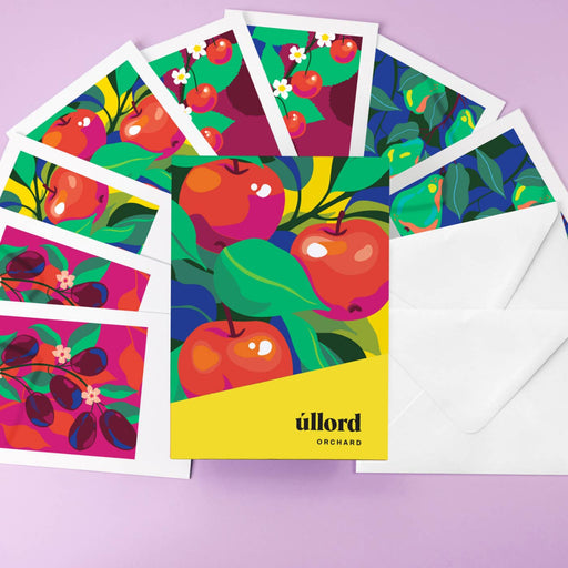 Colorful greeting cards with apple designs and 'ullord' branding on a purple background