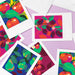 Colorful fruit illustrations on white cards with a purple background