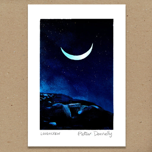 A vertical art print featuring a crescent moon in a starry night sky over dark rocky hills, with a white border and the text 'LOUGHCREW Peter Donnelly' at the bottom, displayed against a brown textured background.