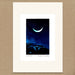 A matted art print featuring a crescent moon in a starry night sky over dark blue hills, displayed on a textured brown background.