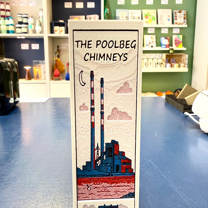 Bookmark with 'The Poolbeg Chimneys' text in a store setting