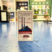 Bookmark with 'The Poolbeg Chimneys' design on a counter in a store.