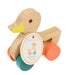 Wooden duck toy with colorful wheels and a tag on a white background